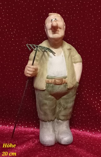 Skulptur gärtner mit rechen - skulptur, rechen"
